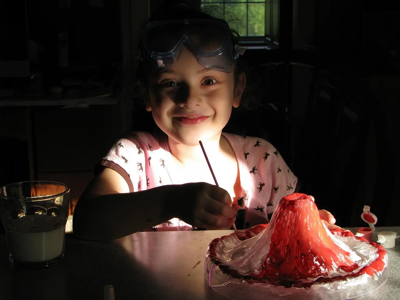A learner conducting a supervised science experiment